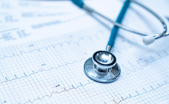 stethoscope on cardiac test results