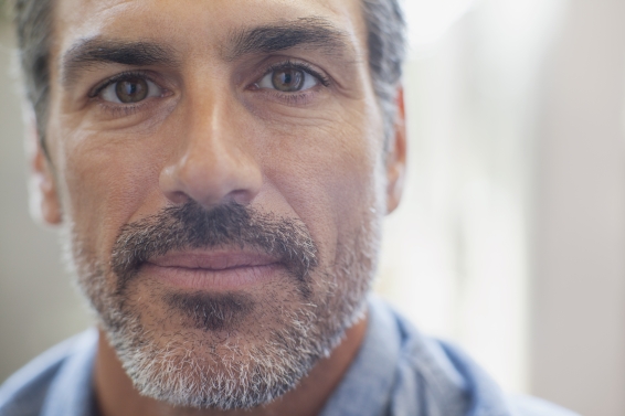 older male looking at camera